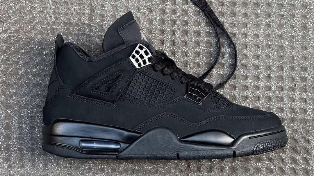 Black Cat, New Night: The Jordan 4 “Black Cat” (2025) and Why Monochrome Never Sleeps